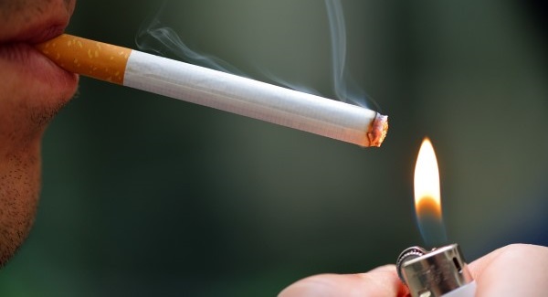 smoking lighting a cigarette
