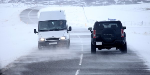 vehicles driving in wintry conditions